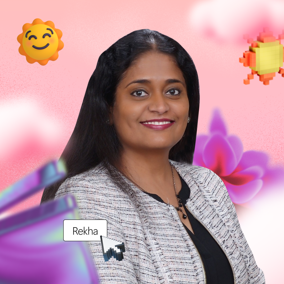 Una persona con cabello largo sonríe, usa un blazer con patrones. El fondo es rosa con flores digitales y gráficos del sol. Un cursor apunta a una caja de texto con la etiqueta "Rekha"